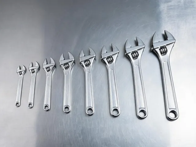Adjustable wrenches